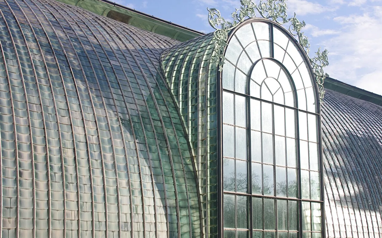 The arched cast-iron end pavilion of the palm house